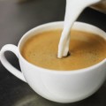 Pouring Milk into Coffee